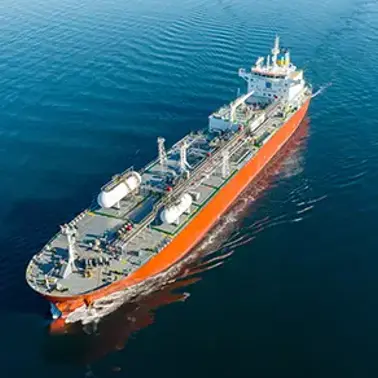 Cargo vessel sailing across open water.